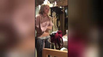 video of Blonde getting ready to go out