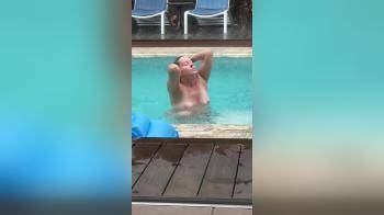 video of Nude wife in pool in downpour