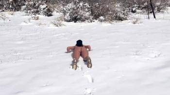 video of a naked snow angel
