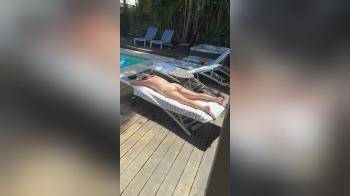 video of Naked wife tanning by pool 1