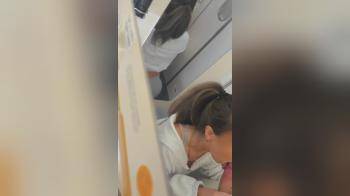 video of Hot couple sucking and fucking in an airplane
