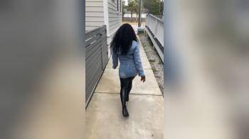 video of Black woman posing in mini skirt