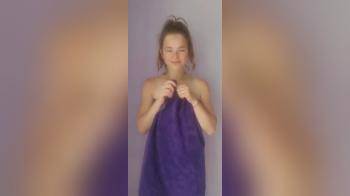 video of Flat brunette showing us her smooth body