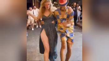 video of Blonde mom on vacation alone.