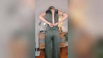 video of Blond unzip and strip