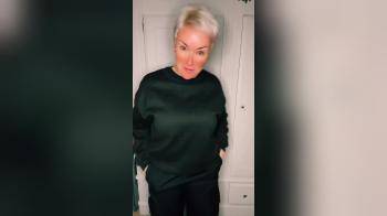 video of Blond posing in pink latex