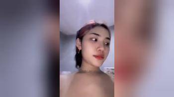 video of Asian beauty takes selfie in public bathrooms