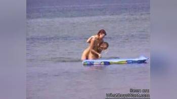 video of two girls in the sea