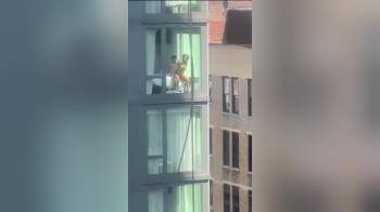 video of Caught couple hard at it in opposite apartment