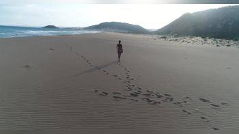 video of Nude wife on a lonely beach