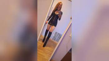video of Hot Brunette in PVC posing