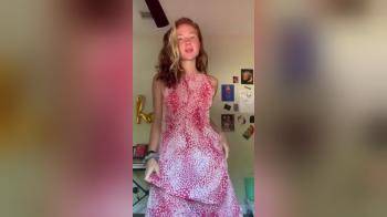 video of Redhead Takes Her Clothes Off