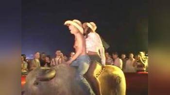 video of topless babes on a bull