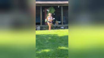 video of Tiny outfit milf outdoors