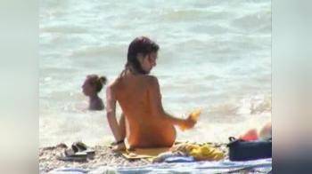 video of Topless beach babe