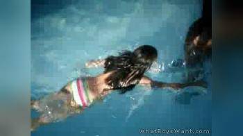 video of 2 girls playing in water