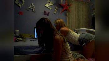 video of 2 girls at computer