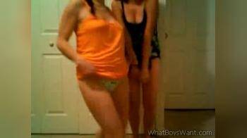 video of two girls dancing and stripping