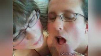 video of 2 with glasses share a facial