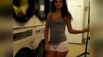 video of Sexy Girl Stripping and Dancing in Public Laundry 