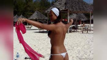 video of topless on beach