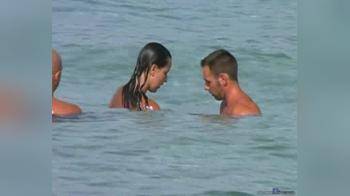 video of 2 couples have sex on the beach
