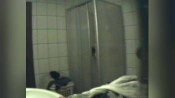 video of large woman in bathroom