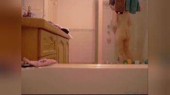 video of hidden camera in bathroom