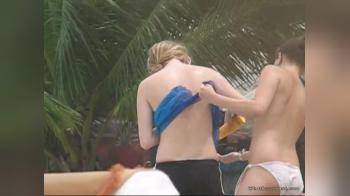 video of Topless on beach (1)