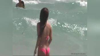 video of Beautiful woman in the waves