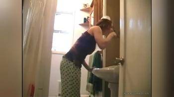 video of Cute redhead in her bathroom